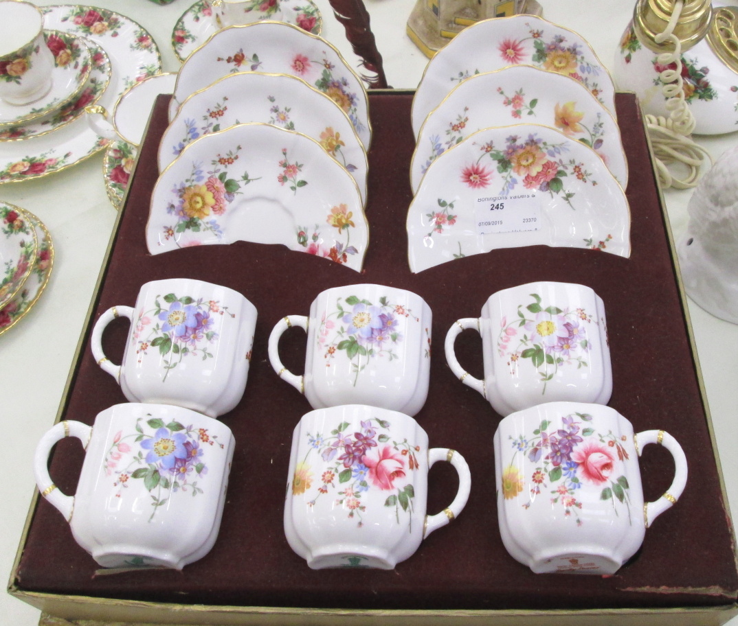 A boxed Royal Crown Derby "Derby Roses" set of six cups and saucers