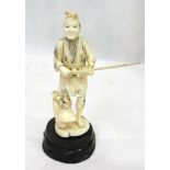 A Meiji period ivory Okimono of a fisherman