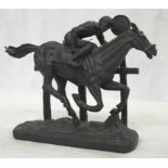 A resin horseracing figure
