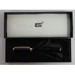 A boxed Mont Blanc pen with original paperwork.