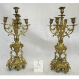A pair of 19th century French five-sconce candelabra bought from The St James Collection,