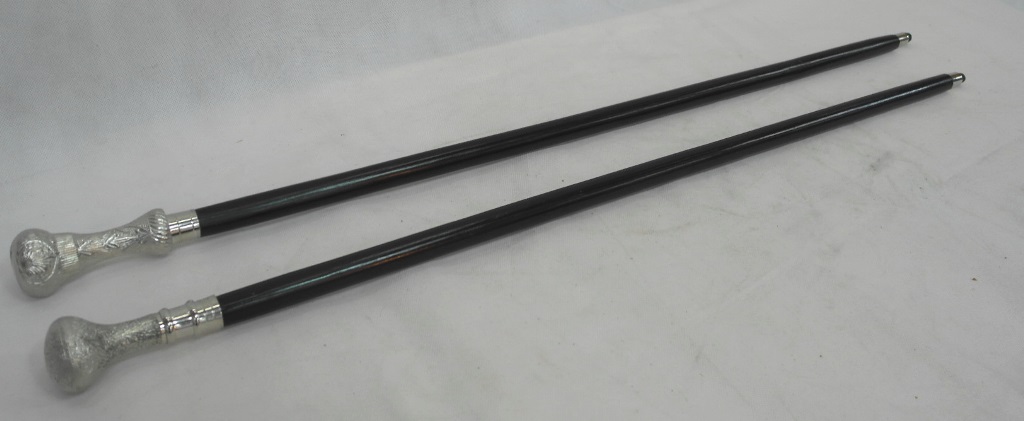 Two silver-topped walking canes