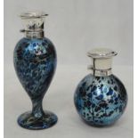 Two silver-topped iridescent Isle-of-Wight perfume bottles