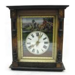 A German wall clock with painted glass dial and pine cone weights,