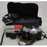 Vintage cameras to inc Zenith and a cased Praktica with extra lenses