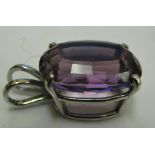 An amethyst set pendant