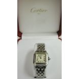 A ladies Panthere Cartier watch on steel strap with sapphire winder (original box and paperwork)