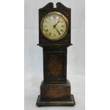 A miniature longcase clock in oak case with crossed arrow mark to dial and movement