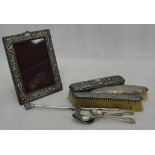 A collection of HM silver to inc a photograph frame,