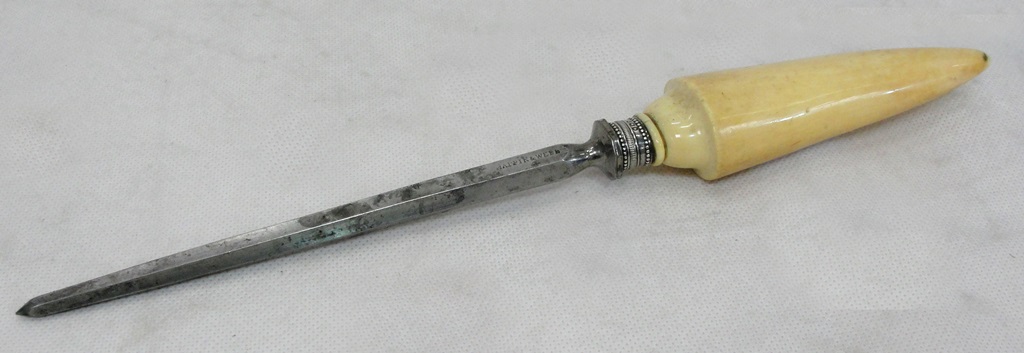 An ivory handled and silver ice pick by Mappin & Webb