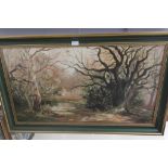 An oil on board depicting a forest landscape,