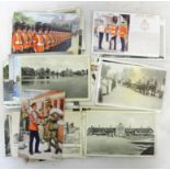 A quantity of postcards to inc military examples