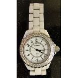 A ladies wristwatch with Chanel J12 white ceramic bracelet