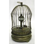 A bird cage automaton clock