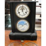 A Victorian style slate twin dial moon face clock