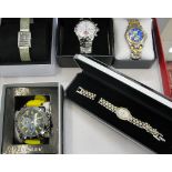 Four boxed dress watches to inc a silver example,