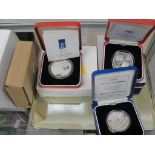 7 x cased silver proof Crown/£5`s