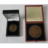 A specimen bronze cased 1837-1897 double headed medallion and British Empire Exhibition Edward VIII