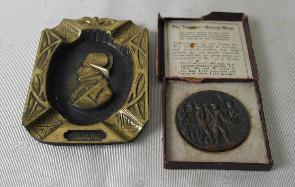 A cased Lusitania medallion together with a Napoleon ashtray