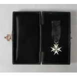 Cased miniature silver Order of Jerusalem.