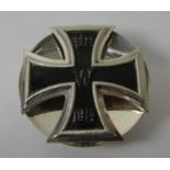 WWI 1st class domed magnetic iron cross with silver back; hallmarked M.Hansen 800 silver.