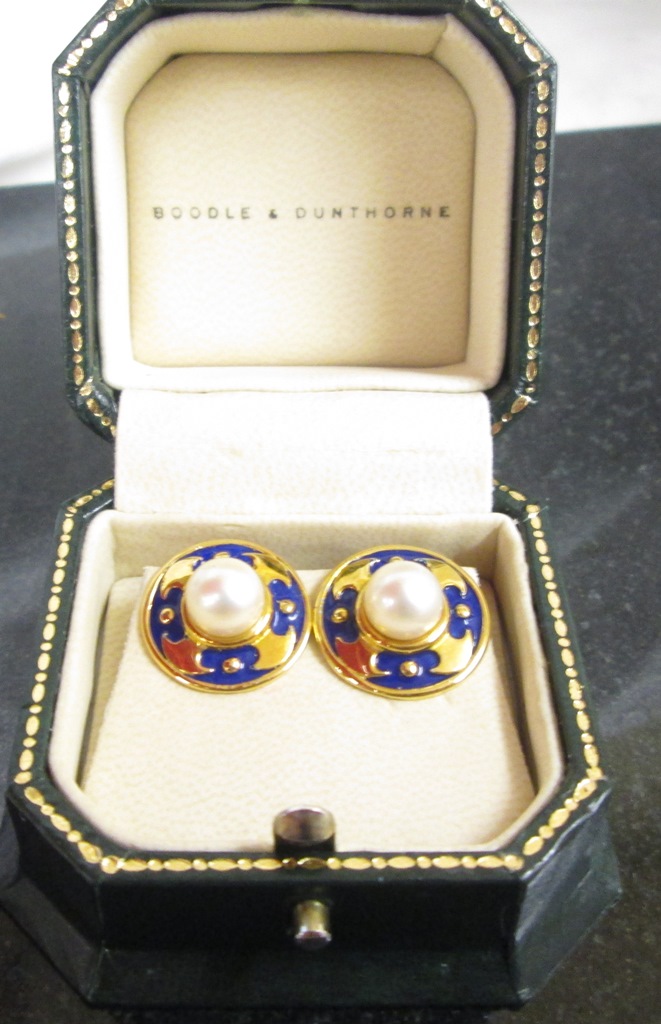 A pair of pearl and enamelled earrings