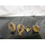 A quantity of gold dress rings and pendant