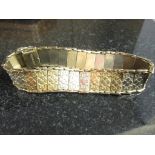 A 9ct gold Edwardian bangle