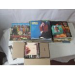 A quantity of Beatles 7" singles and LPs