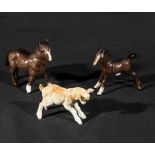 Three small Beswick figures two ponies and a goat