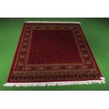 A red ground Bokhara carpet, 2.30m 1.60m