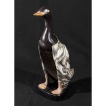 A 1920's duck brush tidy