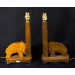 A pair of wooden table lamps modelled as elephants