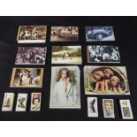 A collection of Nostalgia postcards and cigarette cards