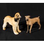 A boxer dog and Afgan hound figures