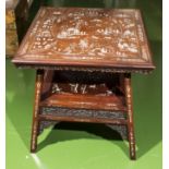 A Chinese carved centre table with ivory inlay