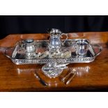 A silver plated tray, two jugs, flatware and other plated items