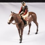 A vintage Brittains cold painted horse and jockey