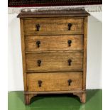 An oak chest of four drawers
