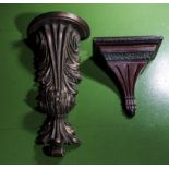 Two carved wooden wall brackets