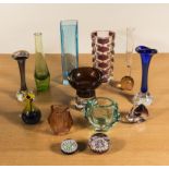 A collection of art glass and paperweights