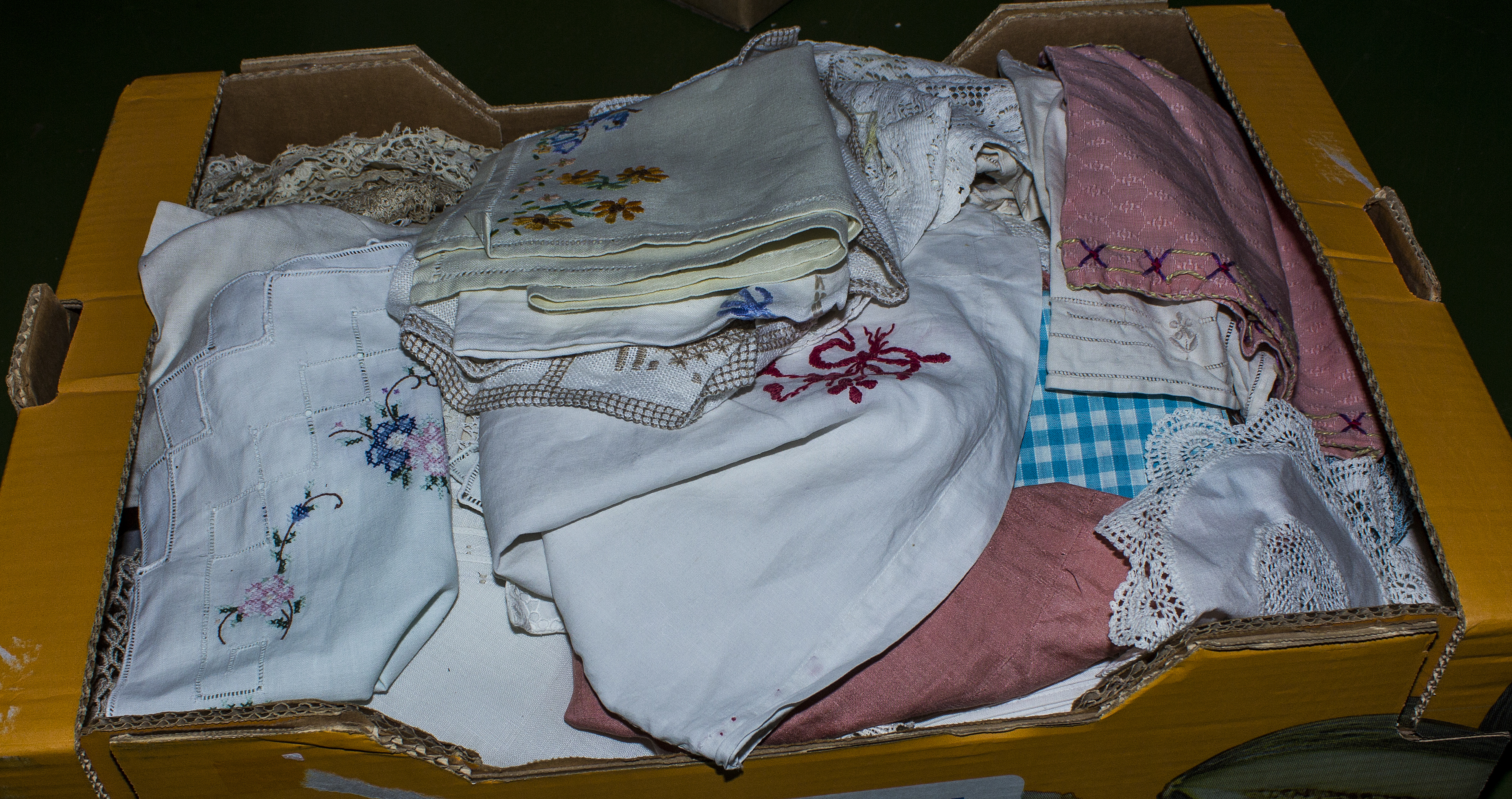 A box of vintage linen