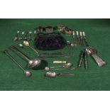 Assorted cutlery, napkin rings and a beaded evening bag