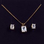 A 925 silver gold plated pendant and earrings set with cubic zirconia 2.2gm