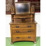 An Art Nouveau oak dressing table