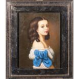 A miniature of a young lady in a metal frame