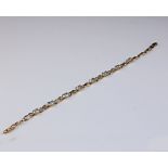 A 9ct gold blue topaz and diamond bracelet