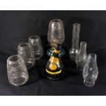 Glass oil lamp chimneys an oil lamp base and other items