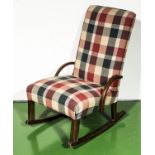 An upholstered rocking chair