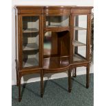 An Edwardian satinwood display cabinet.